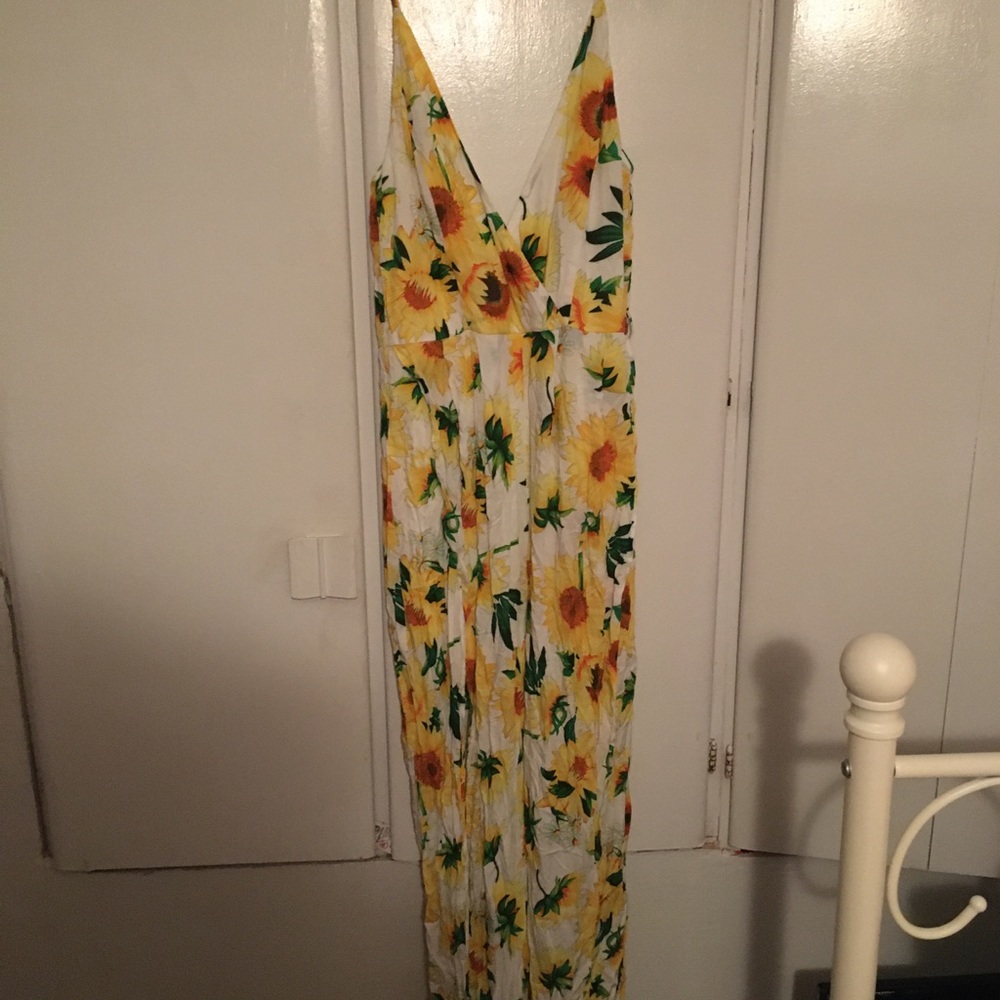 Cute jumpsuit with slits on both legs small NWOT